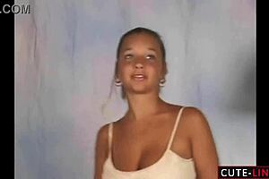 model dancing in beige dress with bouncing chest and jumping tits