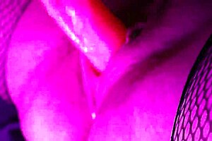 enjoying a relaxing solo session with my favorite pink toy in stockings