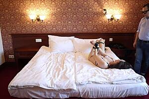 Sofi endures belt bondage in a hotel room