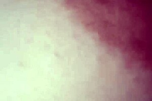 intriguing close-up of nipple on piano keys in detailed view