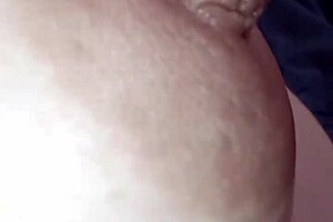 intriguing close-up of nipple on piano keys in detailed view