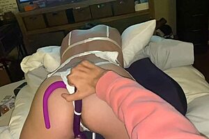 cute girl stretches all holes with toys