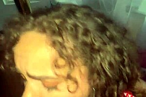 curly-haired beauty enjoys gentle facial