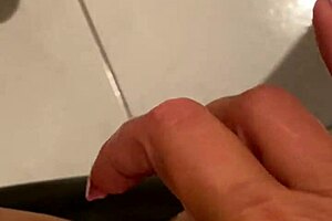 mature blonde masturbates while alone at home