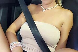 Amateur milf sitting on a co driver place and making naughty content on a public road