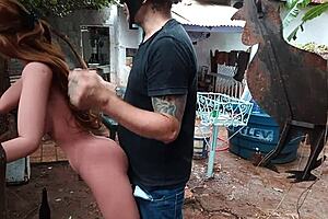 Redhead passionately uses sex toy on her ass.