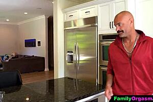 After the game, the athletic cheerleader goes to the garage for a private celebration