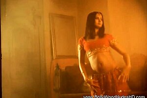 noticing her exotic beauty in sensual striptease dance