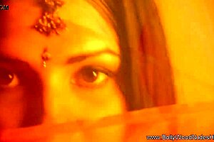 noticing her exotic beauty in sensual striptease dance