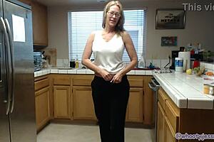Jess Ryan, that sexy milf, is alone in the kitchen roleplaying and showing her big ass