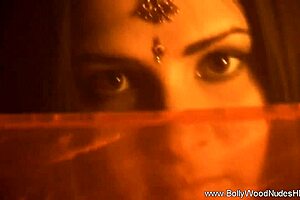 noticing her exotic beauty in sensual striptease dance