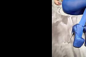 Sexy Pantyhose And Blue High Heels On Display