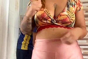 Married woman flashes with husband nearby in exhibitionist moment.