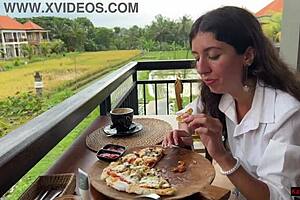 Eating Pizza With Sauce On Face In Public Cafe