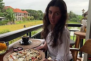 Eating Pizza With Sauce On Face In Public Cafe