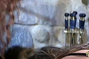 The fake tits on this anal slut bounce as guys ram her hard