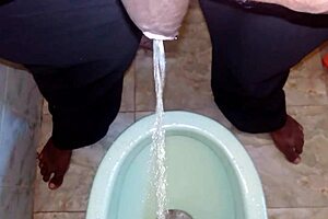 Watch This Black Man Pissing Freely?
