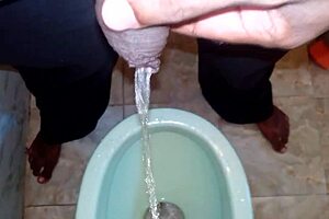 Watch This Black Man Pissing Freely?