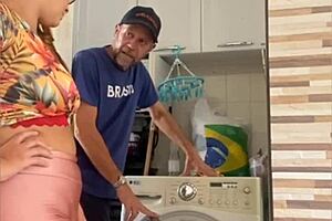 Married woman flashes with husband nearby in exhibitionist moment.