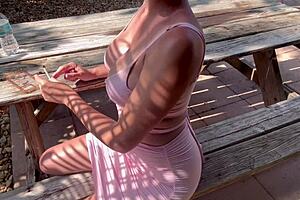 Italian milf shows off big tits outdoor