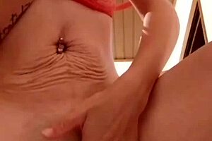 horny woman masturbates alone, cumming hard on her finger