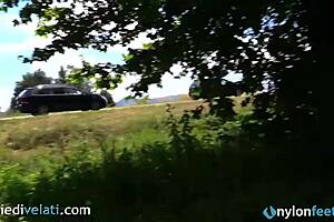 brunette in black pantyhose flashing feet from car 😍