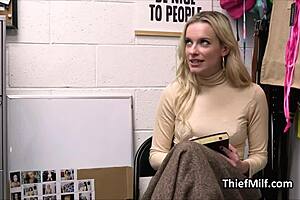 Blonde milf housewife kneels at work