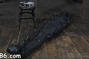 Upside down hottie has nipples clamped during hardcore sex.