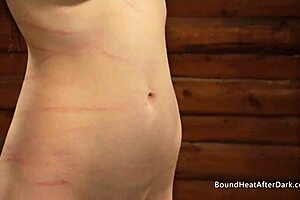 pale white lesbian slave with big natural tits tied up and whipped hard by femdom mistress in bondage domination