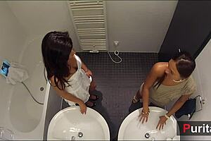 cam girls duo in bathroom voyeur scene