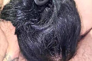 The mature woman performs blowjob and handjob underwater in the bathroom, getting cum covered