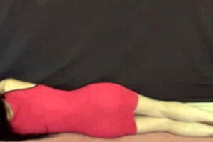 Pink front zipper minidress on floor & face mask for asian shemale