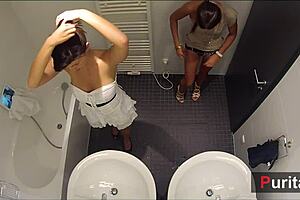 cam girls duo in bathroom voyeur scene