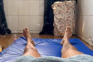 relaxing massage with intimate touches in bedroom setting