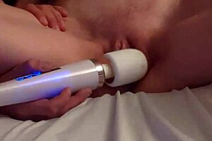 in a 4k close up, richelle rose masturbates solo with a wand, cumming multiple times during her intense session.