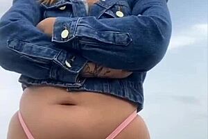 Exhibitionists flashing on the beach, teasing the crowd