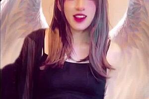 Cute Japanese Shemale Masturbates While Streaming