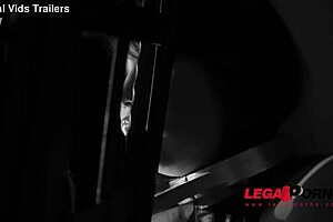 Busty Tigerr Benson endures extreme anal domination in dark chamber.