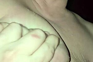 hey, check out this milf milking her big tits while riding that cock