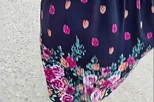 Following mature woman in skirt and thong on street