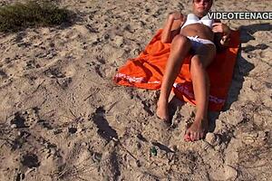 Tania's Tempting Nude Display of Natural Small Tits on the French Beach