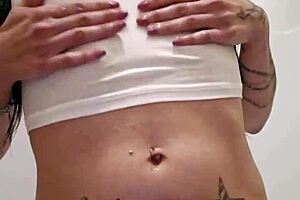 look at emy angel posing in her wet t-shirt, it's so revealing