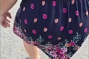 Following mature woman in skirt and thong on street