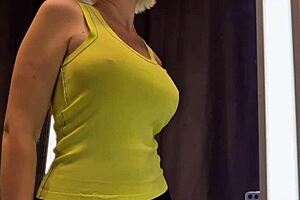 curvy blonde with big tits tries on sexy see-through outfit in changing room