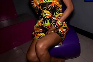 Ladyboy in a sundress plays with anal beads before fucked