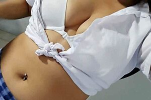 beautiful student getting excited while singing and doing homework