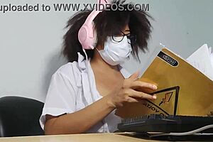 beautiful student getting excited while singing and doing homework