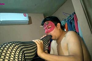 indulge in fishnet-clad feet and big tits for a tantalizing footjob experience with bbw milf