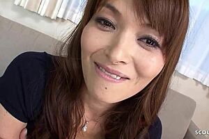 japanese woman climaxes from clit play with two guys in jav