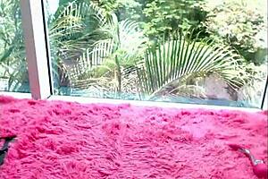 a german teen with small tits plays in the window on cam